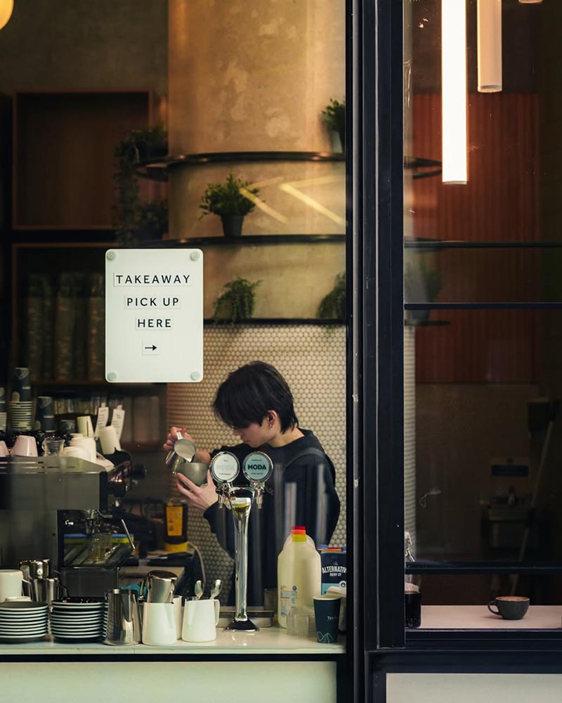 MODA tap on a busy cafe counter